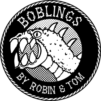 A monster head with sharp teeth surrounded by the words Boblings - Tom & Robin