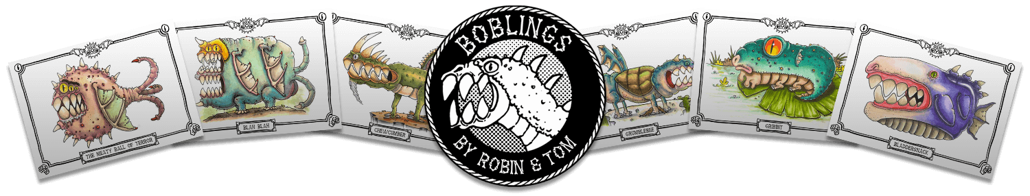 A monster head with sharp teeth surrounded by the words Boblings - Tom & Robin